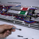 A Huawei engineer displays parts in the research and development area of the Bantian campus on April 12, 2019 in Shenzhen, China.